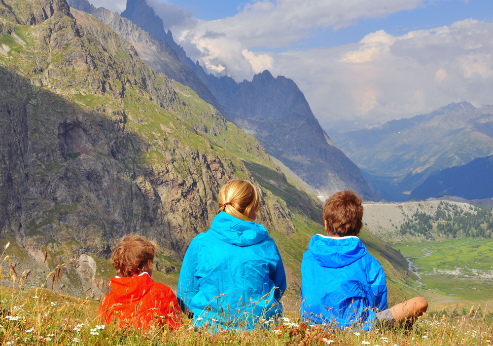 kids hiking in the alps - Image courtesy of ShutterStock